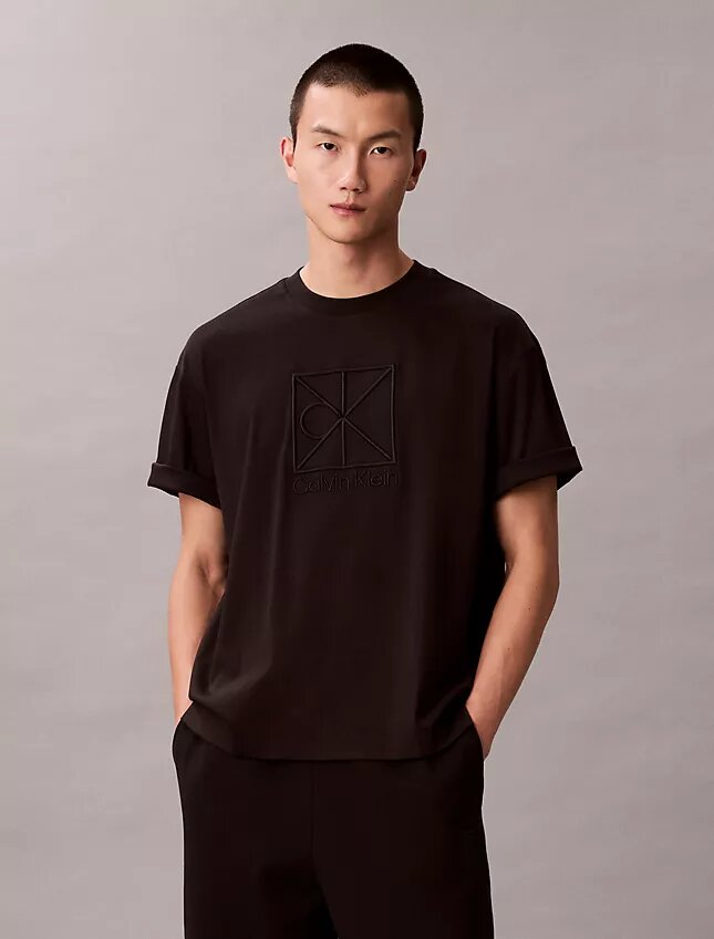 Χαλαρό T-shirt με γραφικό λογότυπο Χαλαρό T-shirt με γραφικό λογότυπο