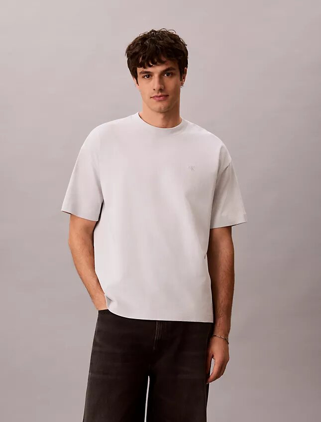 Χαλαρό T-shirt με γραφικό Monologo σε φθαρμένο στυλ Χαλαρό T-shirt με γραφικό Monologo σε φθαρμένο στυλ