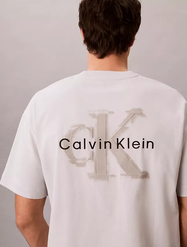 Χαλαρό T-shirt με γραφικό Monologo σε φθαρμένο στυλ Χαλαρό T-shirt με γραφικό Monologo σε φθαρμένο στυλ