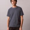 Χαλαρό T-shirt με μοτίβο Monogram σε όλη την επιφάνεια Χαλαρό T-shirt με μοτίβο Monogram σε όλη την επιφάνεια