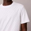 Χαλαρό T-shirt με μοτίβο Monogram σε όλη την επιφάνεια Χαλαρό T-shirt με μοτίβο Monogram σε όλη την επιφάνεια