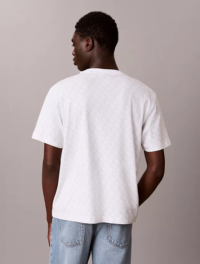 Χαλαρό T-shirt με μοτίβο Monogram σε όλη την επιφάνεια Χαλαρό T-shirt με μοτίβο Monogram σε όλη την επιφάνεια