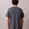 Χαλαρό T-shirt με μοτίβο Monogram σε όλη την επιφάνεια Χαλαρό T-shirt με μοτίβο Monogram σε όλη την επιφάνεια