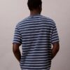 Χαλαρό T-shirt με ρίγες και λογότυπο