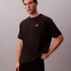 Δροσερό, χαλαρό T-shirt με λογότυπο από πικέ