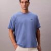 Δροσερό, χαλαρό T-shirt με λογότυπο από πικέ