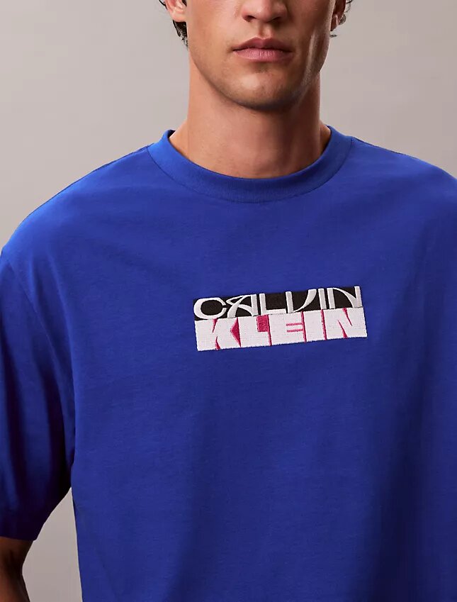 Φαρδύ T-shirt με γραφικό λογότυπο Φαρδύ T-shirt με γραφικό λογότυπο