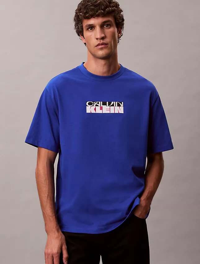 Φαρδύ T-shirt με γραφικό λογότυπο Φαρδύ T-shirt με γραφικό λογότυπο