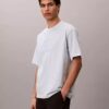 Φαρδύ T-shirt με γραφικό λογότυπο Φαρδύ T-shirt με γραφικό λογότυπο