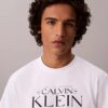 Φαρδύ T-shirt με γραφικό λογότυπο Φαρδύ T-shirt με γραφικό λογότυπο