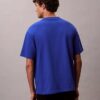 Φαρδύ T-shirt με γραφικό λογότυπο Φαρδύ T-shirt με γραφικό λογότυπο