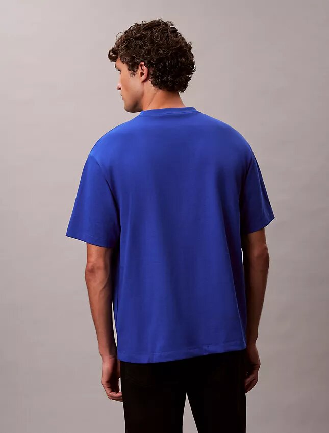 Φαρδύ T-shirt με γραφικό λογότυπο Φαρδύ T-shirt με γραφικό λογότυπο