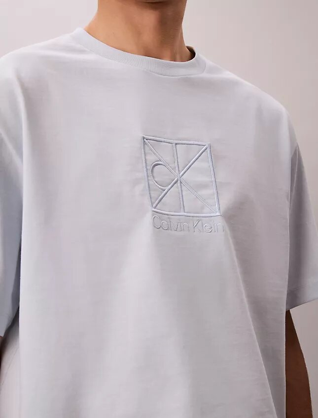 Φαρδύ T-shirt με γραφικό λογότυπο Φαρδύ T-shirt με γραφικό λογότυπο