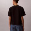 Φθαρμένο γραφικό λογότυπο σε φαρδύ T-shirt Φθαρμένο γραφικό λογότυπο σε φαρδύ T-shirt