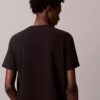 Κλασικό T-shirt με γραφικό λογότυπο σε σκιώδη απόδοση Κλασικό T-shirt με γραφικό λογότυπο σε σκιώδη απόδοση