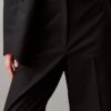 Κομψό παντελόνι με φαρδιά γραμμή και ελαστικότητα Κομψό παντελόνι με φαρδιά γραμμή και ελαστικότητα