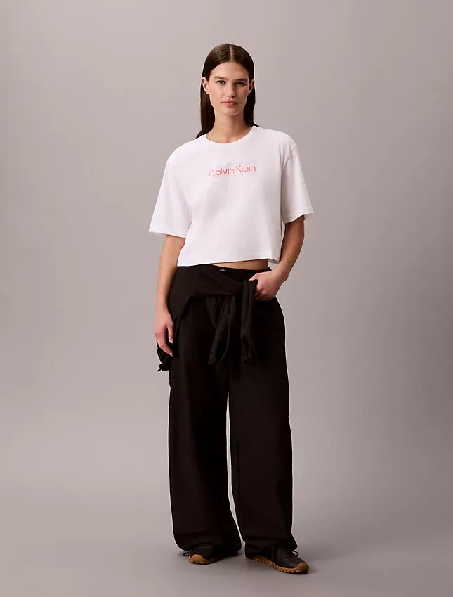 Κοντό, φαρδύ T-shirt για τις μετακινήσεις Κοντό, φαρδύ T-shirt για τις μετακινήσεις