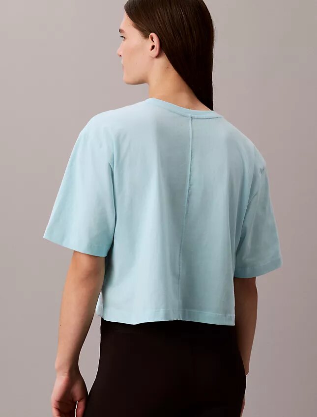 Κοντό, φαρδύ T-shirt για τις μετακινήσεις Κοντό, φαρδύ T-shirt για τις μετακινήσεις