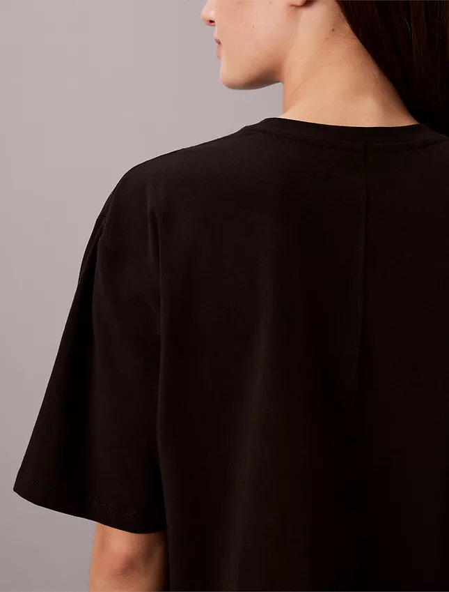 Κοντό, φαρδύ T-shirt για τις μετακινήσεις Κοντό, φαρδύ T-shirt για τις μετακινήσεις