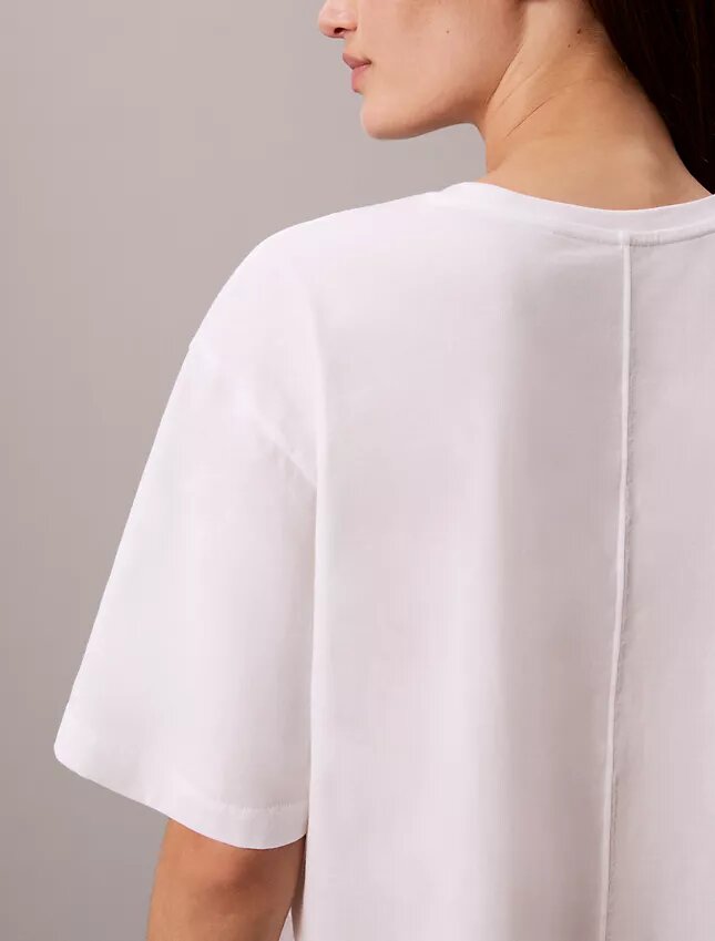 Κοντό, φαρδύ T-shirt για τις μετακινήσεις Κοντό, φαρδύ T-shirt για τις μετακινήσεις