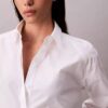 Κοντό πουκάμισο με κουμπιά και τετράγωνη γραμμή Κοντό πουκάμισο με κουμπιά και τετράγωνη γραμμή