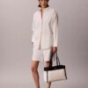 Μεσαία τσάντα tote από καμβά με Monogram Μεσαία τσάντα tote από καμβά με Monogram