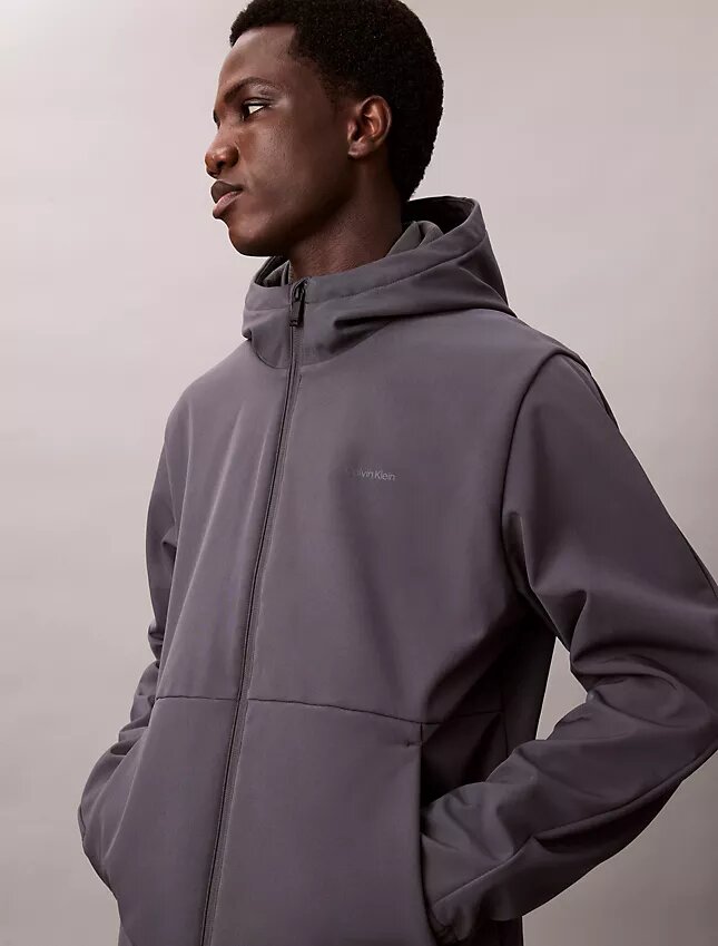 Μπουφάν Softshell με κουκούλα και φερμουάρ Μπουφάν Softshell με κουκούλα και φερμουάρ