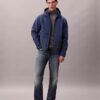 Μπουφάν Softshell με κουκούλα και φερμουάρ Μπουφάν Softshell με κουκούλα και φερμουάρ
