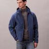 Μπουφάν Softshell με κουκούλα και φερμουάρ Μπουφάν Softshell με κουκούλα και φερμουάρ