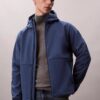 Μπουφάν Softshell με κουκούλα και φερμουάρ Μπουφάν Softshell με κουκούλα και φερμουάρ