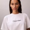 Τ-shirt με στρογγυλό λαιμό και τυπικό λογότυπο σε φαρδιά γραμμή Τ-shirt με στρογγυλό λαιμό και τυπικό λογότυπο σε φαρδιά γραμμή